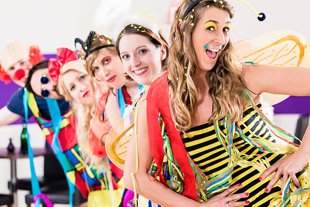 istock Party people celebrating carnival or new years eve 499811900