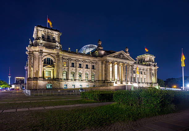 istock German parliament (Reichstag) building in Berlin at night 499812358