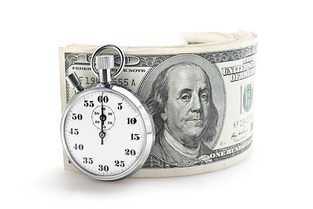 stop watch (ストップウォッチ)およびドル - finance photography us currency stopwatch ストックフォトと画像