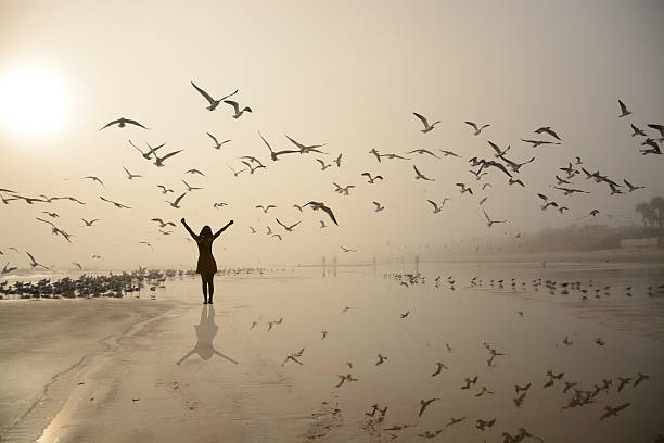 istock Happy girl relaxing on the beach. 499814268