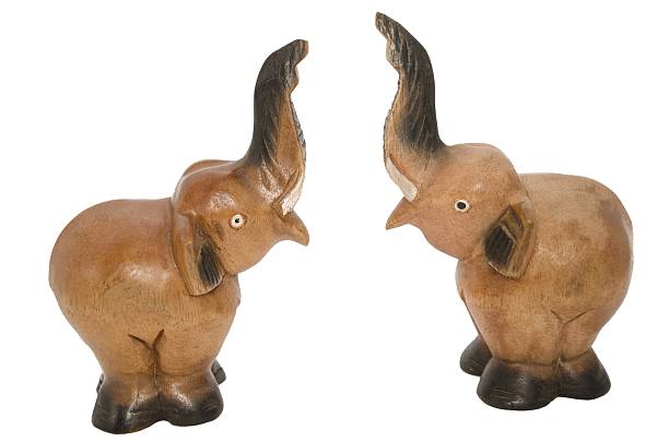 istock Small wooden elephant figurines 499839269