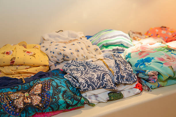 istock Selection of womens tops on shelf 499840053