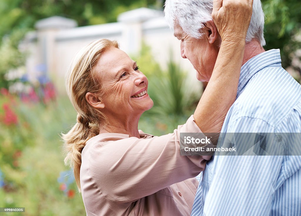 Still young at heart Shot of a old couple glazing intimately at each otherhttp://195.154.178.81/DATA/i_collage/pu/shoots/784861.jpg 60-69 Years Stock Photo