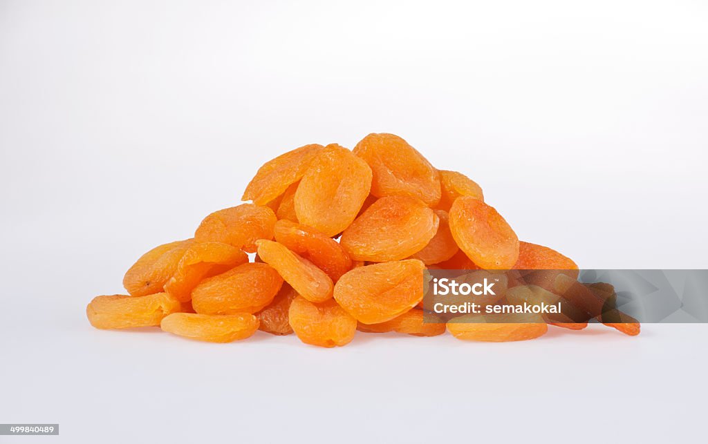 Dried apricots.XXXL A close-up of dried apricots on the white background.Nobody. Apricot Stock Photo