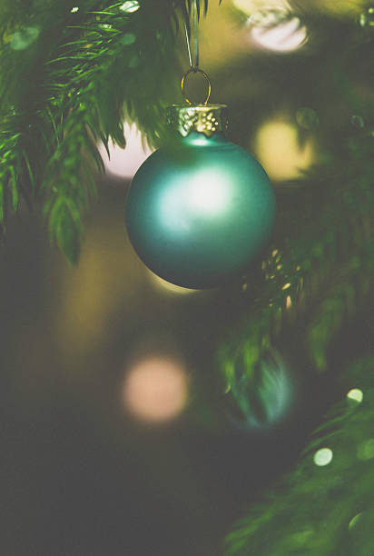 istock Pastel colored Christmas ornaments on Christmas tree branches 499842630