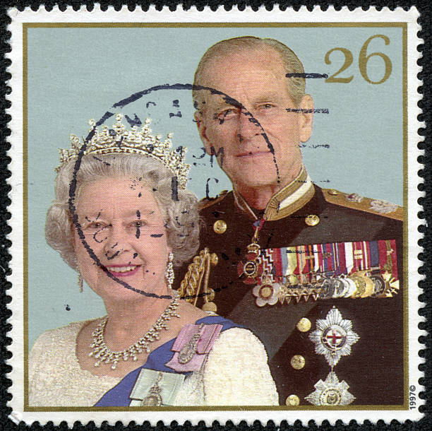 Queen Elizabeth II and Duke of Edinburgh Prince Philip Chongqing, Сhina - April 15, 2014:  british post stamp circa 1997,celebrating the golden anniversary of the royal wedding of Queen Elizabeth II and Duke of Edinburgh Prince Philip, coronation photos stock pictures, royalty-free photos & images
