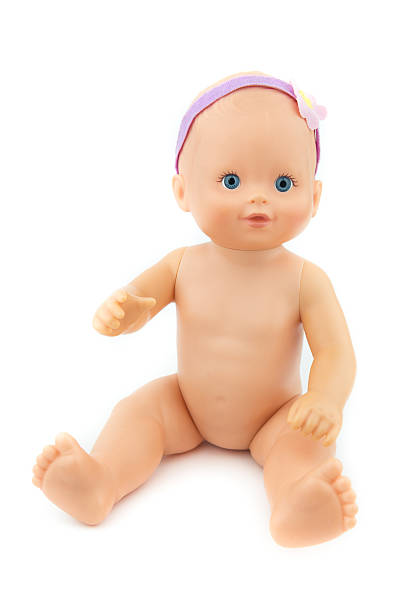 istock naked baby doll, isolate background 499845118
