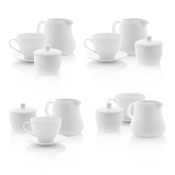 istock White milk jug, sugar bowl and coffee cup 499845875