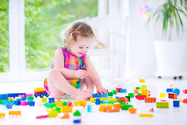 istock Sweet girl playing with blocks 499845937