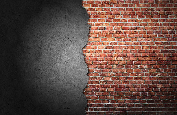 Old cracked brick wall stock photo