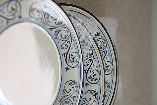 istock set of blue dishes being packed 499849272