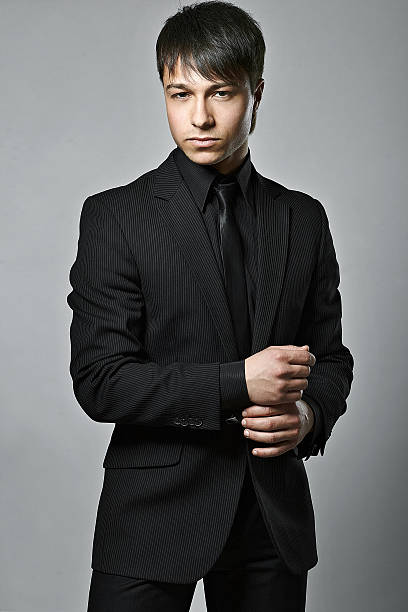 istock Fashion trendy elegant young black suit man 499849862