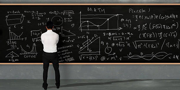 istock Businessman Trying To Solve math Equivalents 499852000