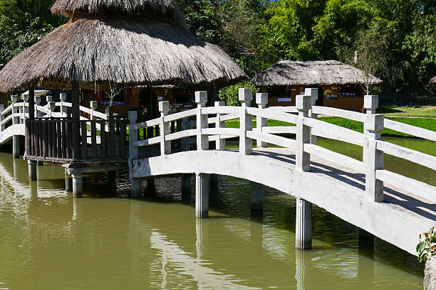 istock cement footbridge across the pond 499853078