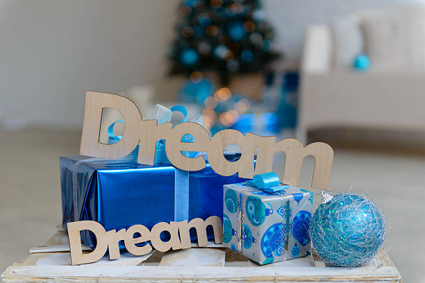 istock Christmas gifts and a fir-tree 499853688
