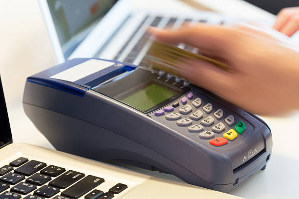 istock Hand Swiping Credit Card In Store 499853958