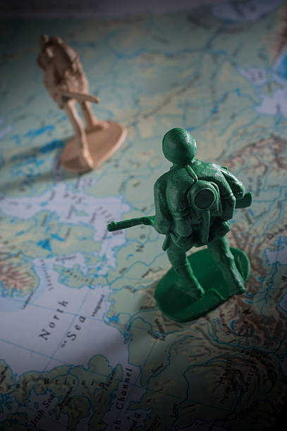 istock Soldier toys on map,war concept.. 499854432