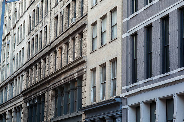 istock Densely packed attached loft buildings in the city. 499854512