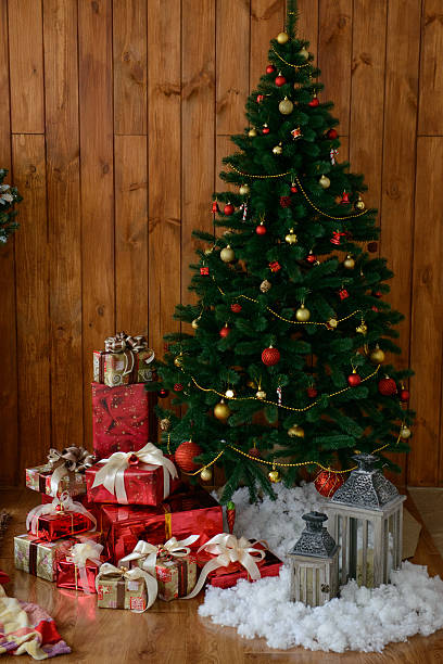 istock Christmas gifts and a fir-tree 499854860