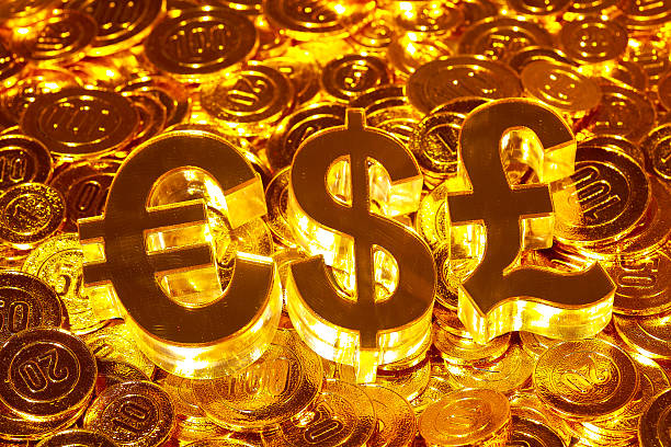 istock 3d icon $ £ € in gold coins heap 499856398
