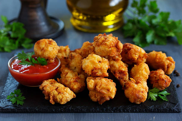 istock Fried nuggets of chicken breast with sauce. 499856752