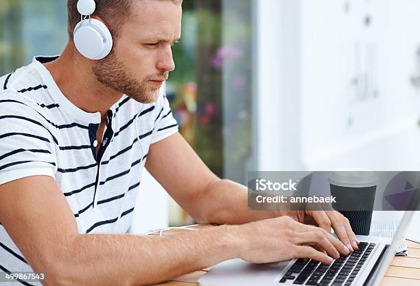 Hes Got His Business Tunes On Stock Photo - Download Image Now - Adult, Adults Only, Arts Culture and Entertainment