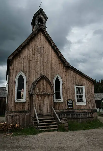 St. Saviour's Anglican Church, main street in Barkerville, an 1860's gold rush town in the Cariboo of British Columbia, Canada.