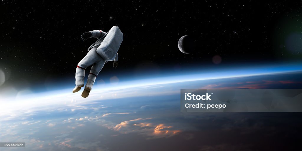 Astronaut Floating In Space A composite image of an untethered astronaut in rear view, isolated and drifting off into deep space above the earth. This image uses a mixture of both CGI elements for the spaceman, and public domain NASA imagery for the earth and moon. The astronaut is wearing a generic space suit. Astronaut Stock Photo