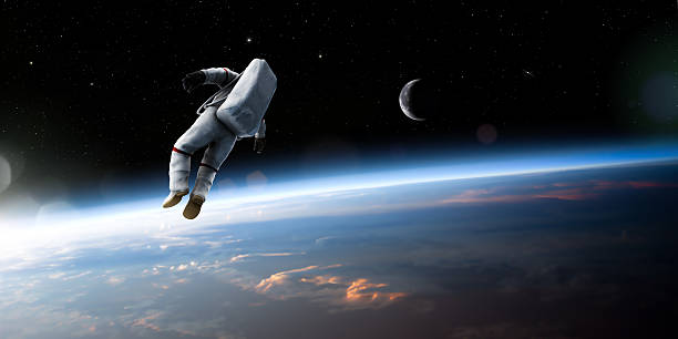 Astronaut Floating In Space A composite image of an untethered astronaut in rear view, isolated and drifting off into deep space above the earth. This image uses a mixture of both CGI elements for the spaceman, and public domain NASA imagery for the earth and moon. The astronaut is wearing a generic space suit. cosmonaut photos stock pictures, royalty-free photos & images