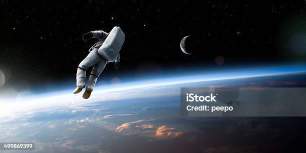 Astronaut Floating In Space Stock Photo - Download Image Now - Astronaut, Outer Space, Empty