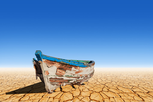 Old boat on dry land