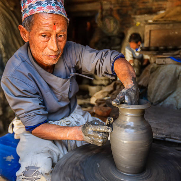 istock Nepali potter working on the pottery square in Bhaktapur 499872787