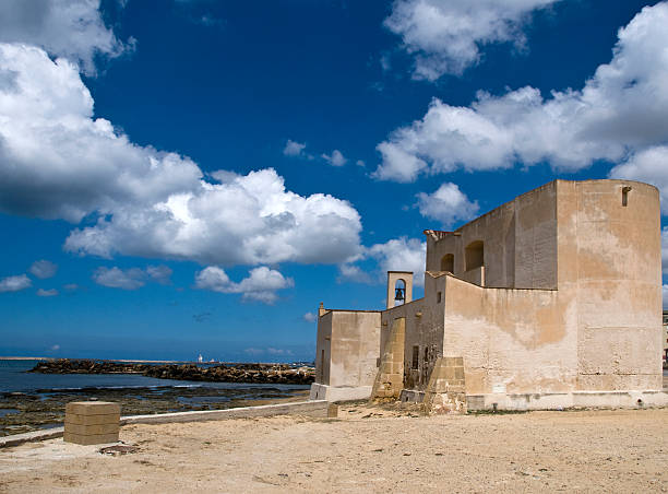 istock Scenic ruin on sea shore 499875966