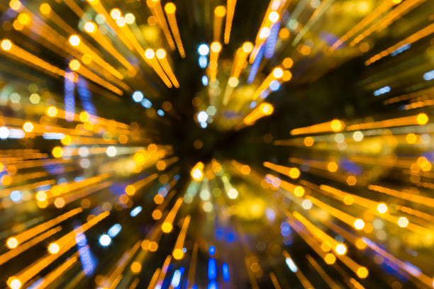 istock yellow, dark, red background with christmas lights in boken. Bokeh 499881250