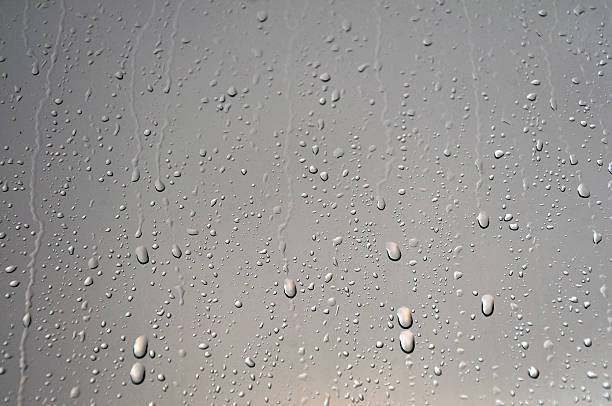 Rain Drop Background of water drops on glass.  water drop texture stock pictures, royalty-free photos & images