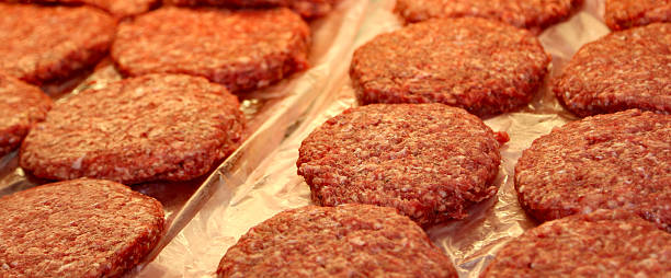 istock beef burger for sale by the butcher 499882804
