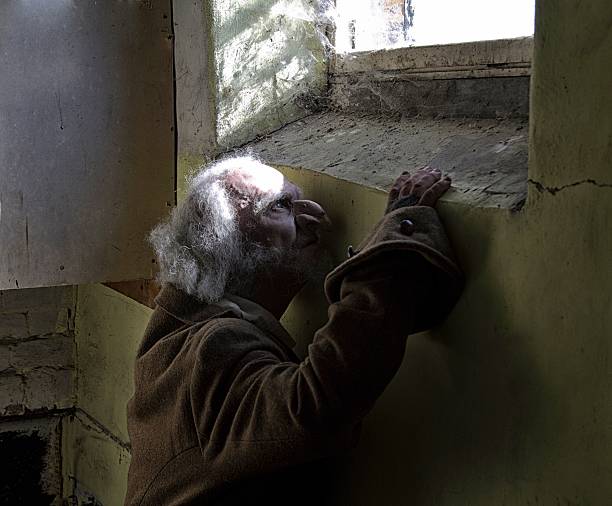 istock scruffy senior man in old building 499883650