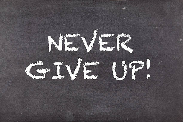istock Never give up, business motivational slogan 499883982