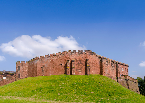 A high-angle of Bannerman castle on a sunny day with water background