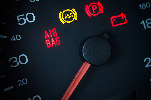 istock Airbag warning light. Car dashboard in closeup 499886772