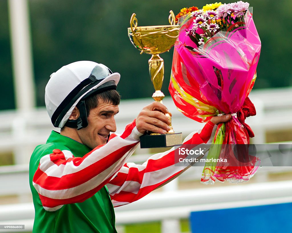 The Winner The Winner,jockeys Timur Guseinov an the race for the prize of the Russian Cup in Pyatigorsk, Caucasus, Russia. Jockey Stock Photo
