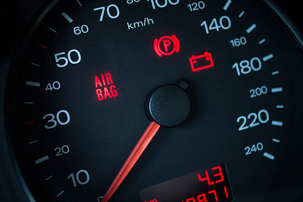 istock Airbag warning light. Car dashboard in closeup 499886810