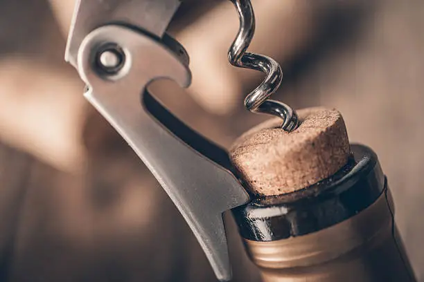 Cork screw and wine bottle