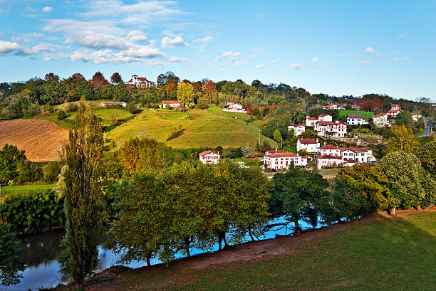 Cambo-les-Bains countryside landscape along Nive river course Countryside of Cambo-les-Bains, French Basque country commune situated in Province of Labourd, Atlantic Pyrenees, Aquitaine, France, in the valley of Nive river cambo les bains stock pictures, royalty-free photos & images