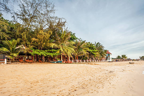 istock Exotic tropical beach under gloomy sky 499888409