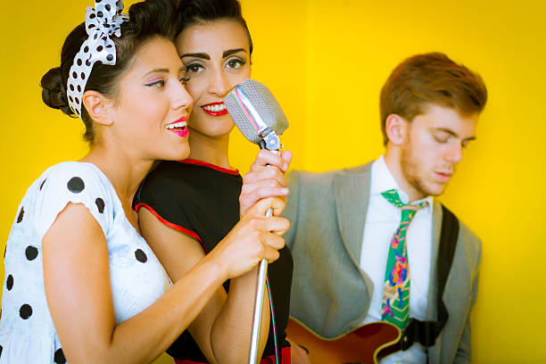 istock 1950's Style - Two swing singers and guitarist 499888571