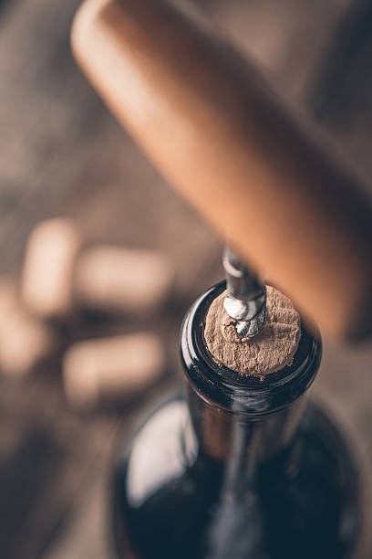 istock Corkscrew and bottle of wine 499888802