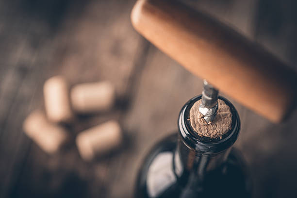 istock Corkscrew and bottle of wine 499888976