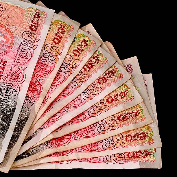 Fifty pound sterling banknotes fanned out clipping path square stock photo