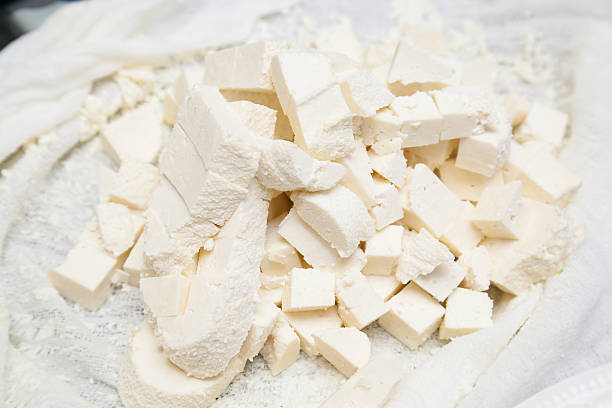 paneer cut into pieces stock photo